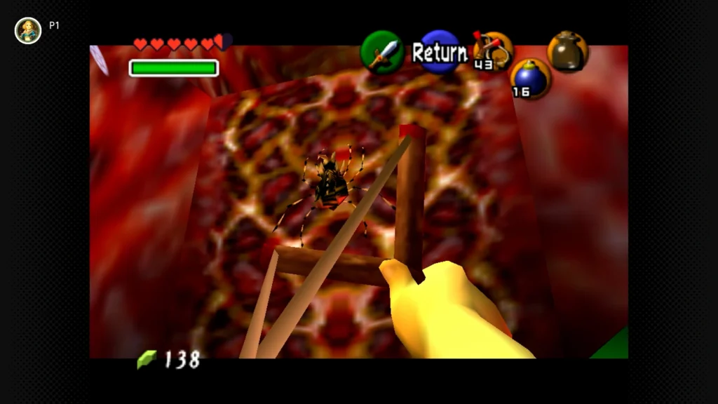 Gold Skulltulas 22 Young Link using the Boomerang to collect a Gold Skulltula token high up on the climbable wall vines inside Jabu-Jabu's Belly.