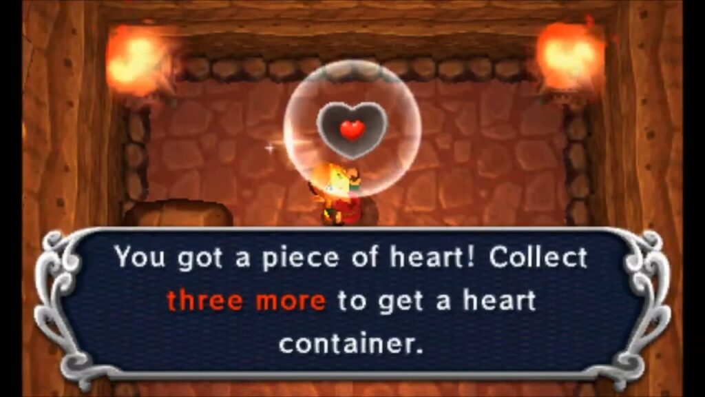 Heart Piece Locations 13 Link claiming the Piece of Heart inside the waterfall cave south of Zora’s Domain in A Link Between Worlds