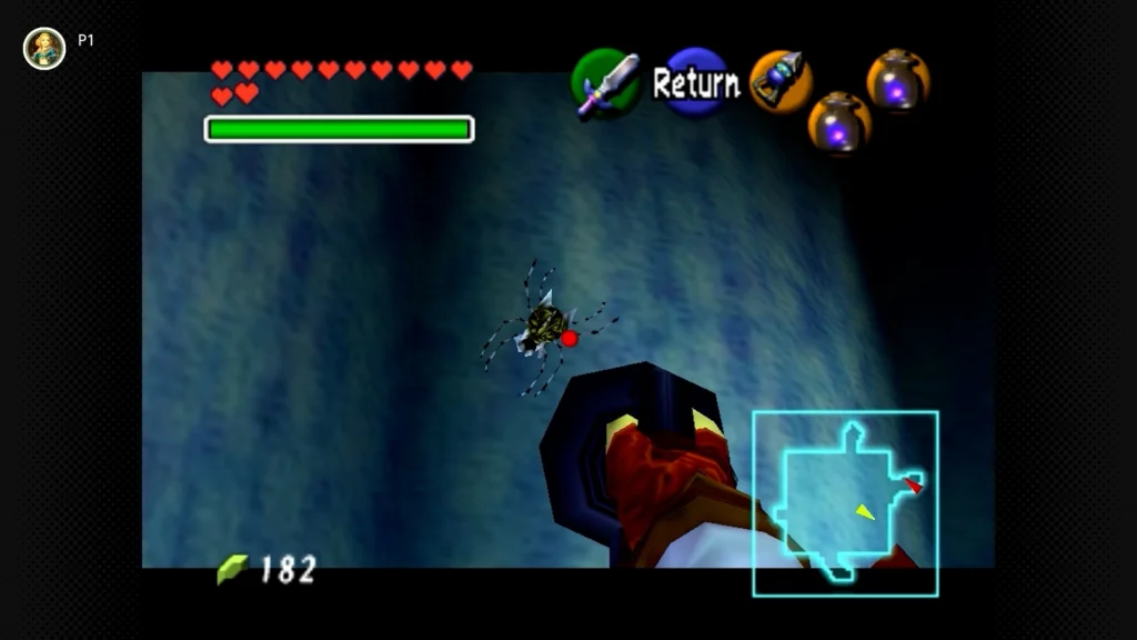 Gold Skulltulas 41 Adult Link standing near a sliding ice block puzzle and targeting a Gold Skulltula high on the wall in the Ice Cavern.
