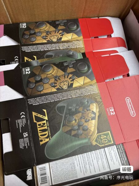 Zelda-Themed Nintendo Switch 2 Console and Pro Controller Appear to Leak in Packaging Photos 4 Multiple leaked Zelda Nintendo Switch 2 Pro Controller boxes featuring the green, black, and gold 40th anniversary design
