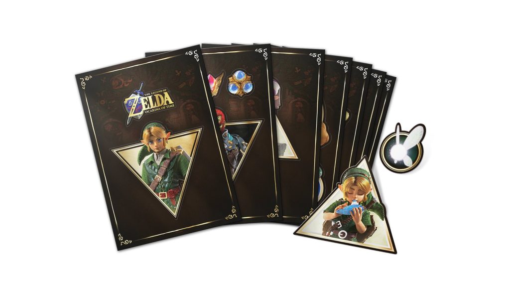 Ocarina of Time Remake Pre-Order Bonuses: Every Regional Exclusive So Far 11 Ocarina of Time Remake sticker set featuring Link, Navi, the Spiritual Stones, and other Zelda artwork as a pre-order bonus.