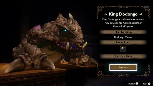 King Dodongo’s statue and information panel in the Ocarina of Time remake’s Hall of Fallen Foes, showing bombs as useful items and a Rematch option. King Dodongo’s statue and information panel in the Ocarina of Time remake’s Hall of Fallen Foes, showing bombs as useful items and a Rematch option.