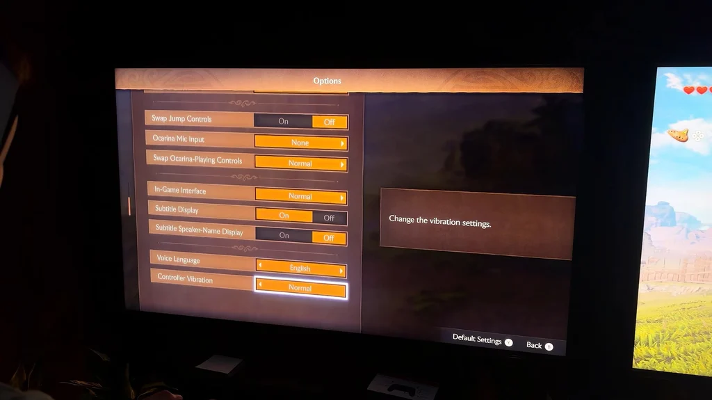 Ocarina of Time remake options screen showing interface, subtitle, voice language, and controller vibration settings. Ocarina of Time remake options screen showing interface, subtitle, voice language, and controller vibration settings.