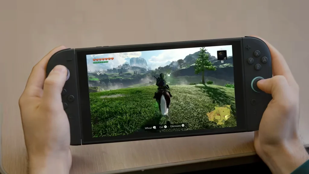 Player holding a Nintendo Switch 2 showing Link riding Epona across Hyrule in Ocarina of Time during the Back to Me commercial.