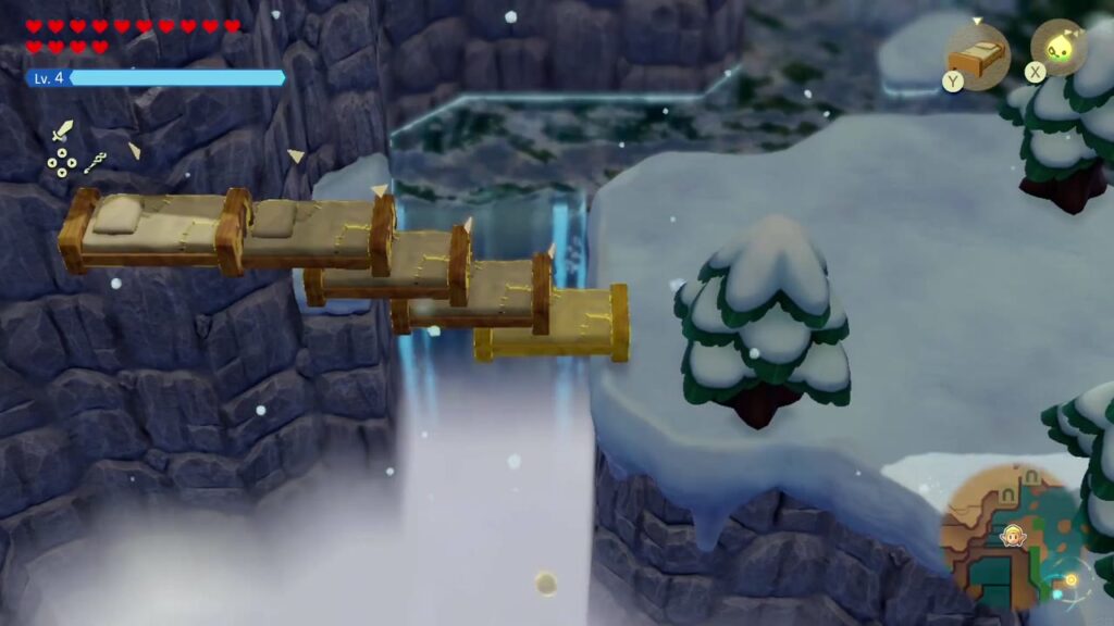 Hebra Mountain: A Rift on Holy Mount Lanayru - The Legend of Zelda: Echoes of Wisdom Walkthrough 59 A row of Old Bed echoes bridges the gap beside a waterfall on the cliffs of Hebra Mountain.