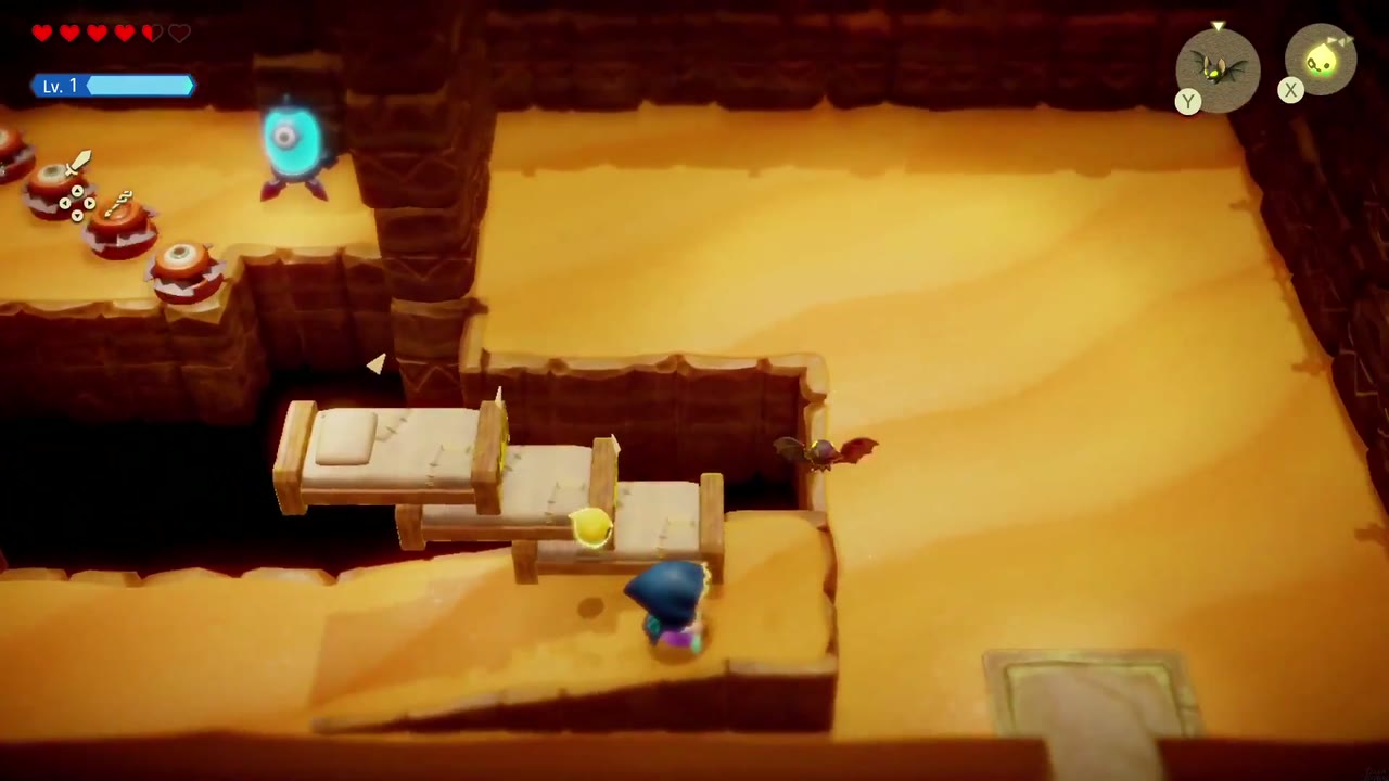 A Rift in the Gerudo Desert - The Legend of Zelda: Echoes of Wisdom Walkthrough 98 Zelda lays Old Bed echoes across a pit to reach the Pathblade-lined ledge with the eye switch.