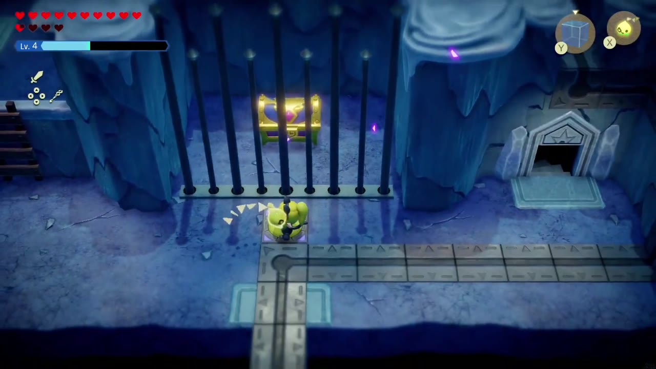 Lanayru Temple Dungeon - The Legend of Zelda: Echoes of Wisdom Walkthrough 52 The big chest locked behind bars, with a small yellow floor switch on the track in front of it.