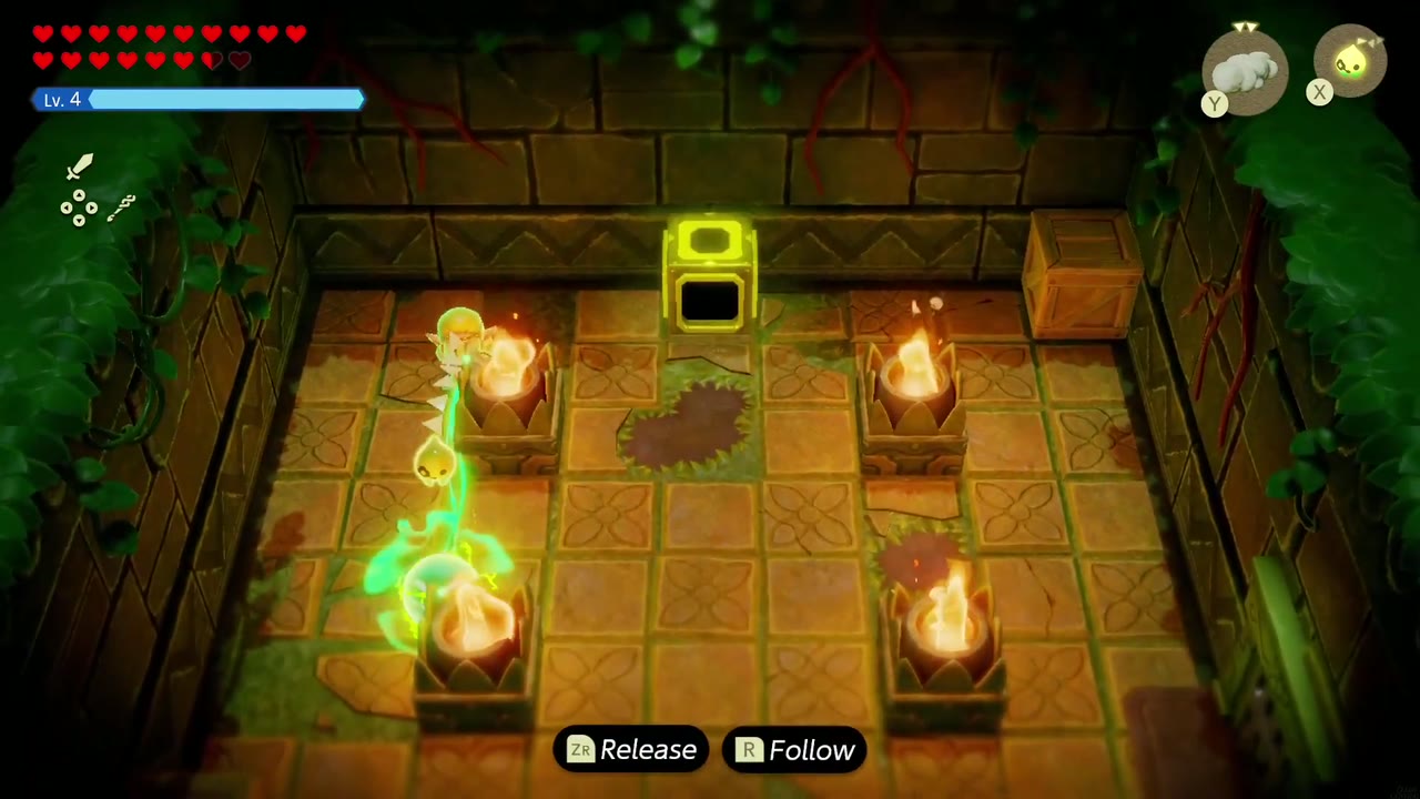 In the torch-lit first room Zelda Binds a green Spark to drag it toward the yellow block. In the torch-lit first room Zelda Binds a green Spark to drag it toward the yellow block.