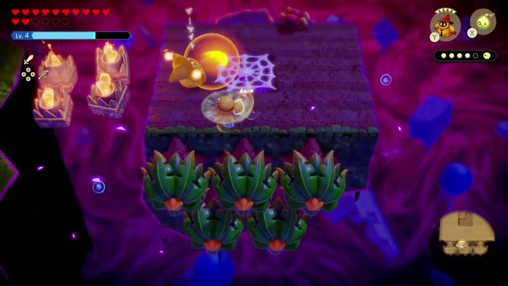 A Rift in the Faron Wetlands - The Legend of Zelda: Echoes of Wisdom Walkthrough 26 A lit-brazier platform with a web and spiky plants near the end of Stilled Blossu's House.