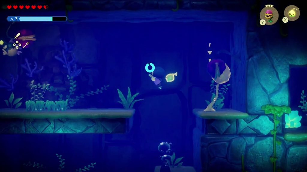 The passage opens into a brighter cavern where another Bio Deku Baba sways on a ledge near Zelda.