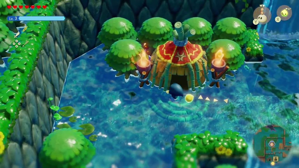 The Jabul Waters Rift - The Legend of Zelda: Echoes of Wisdom Walkthrough 19 The red, star-patterned hut of Chief Dradd, flanked by torches in River Zora Village.