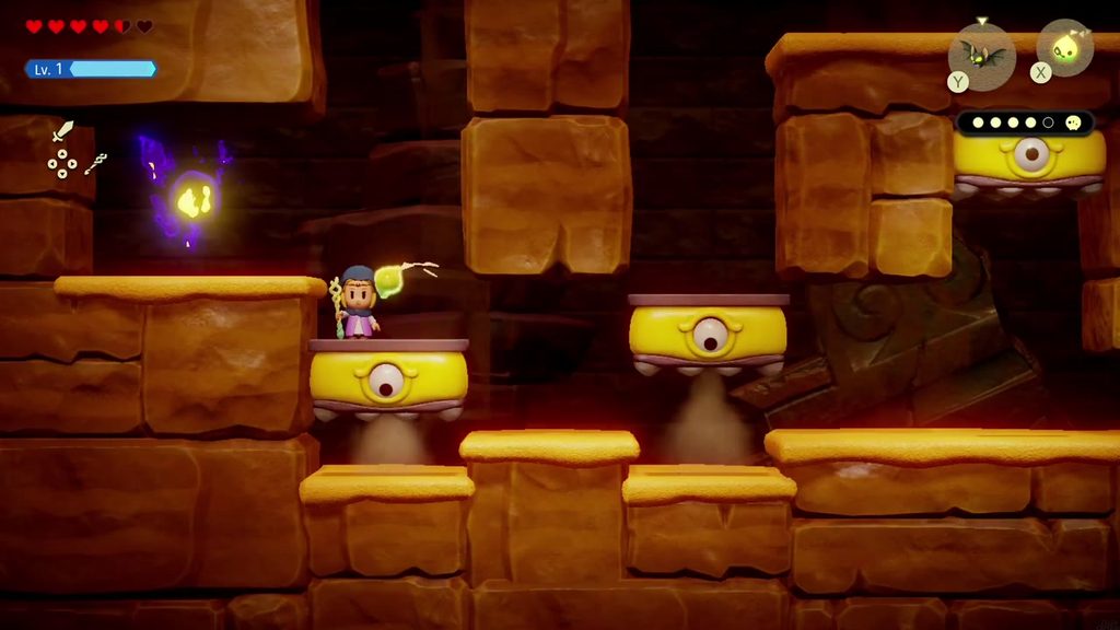 A Rift in the Gerudo Desert - The Legend of Zelda: Echoes of Wisdom Walkthrough 85 Zelda climbs the arranged yellow eye blocks toward the last trapped Tri friend on the upper left ledge.