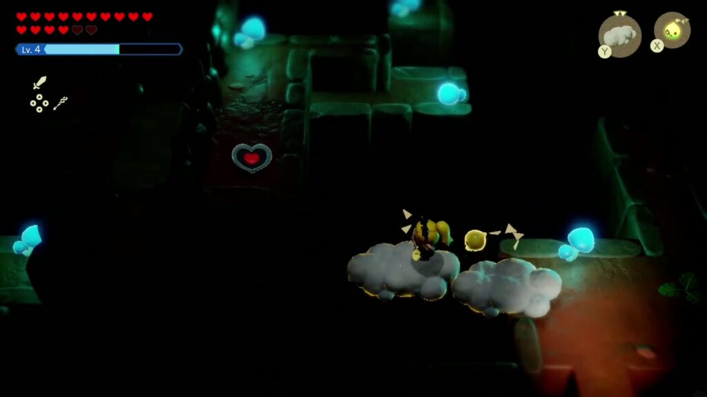 A Rift in the Faron Wetlands - The Legend of Zelda: Echoes of Wisdom Walkthrough 65 Zelda rides a Cloud echo across the dark gap toward the Piece of Heart ledge in the Faron Wetlands cave.