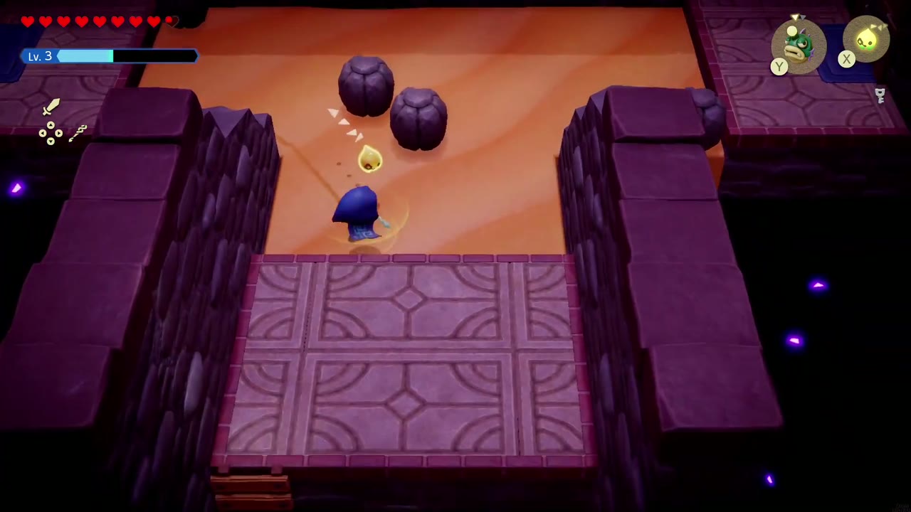 Hyrule Castle: Still Missing - The Legend of Zelda: Echoes of Wisdom Walkthrough 99 Zelda crosses the east sand room, past the boulders, toward its south exit.