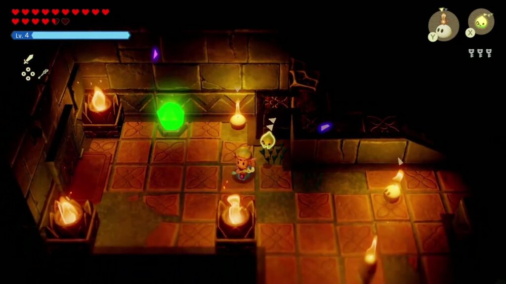 Faron Temple Dungeon - The Legend of Zelda: Echoes of Wisdom Walkthrough 62 Dark room of braziers and stairs above the water, with a green crystal switch beside Zelda.