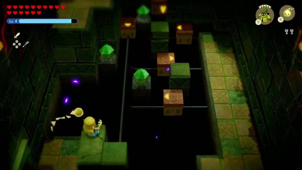 Faron Temple Dungeon - The Legend of Zelda: Echoes of Wisdom Walkthrough 25 Zelda enters the dark pit room, with green crystal switches set on pillars across the gaps.