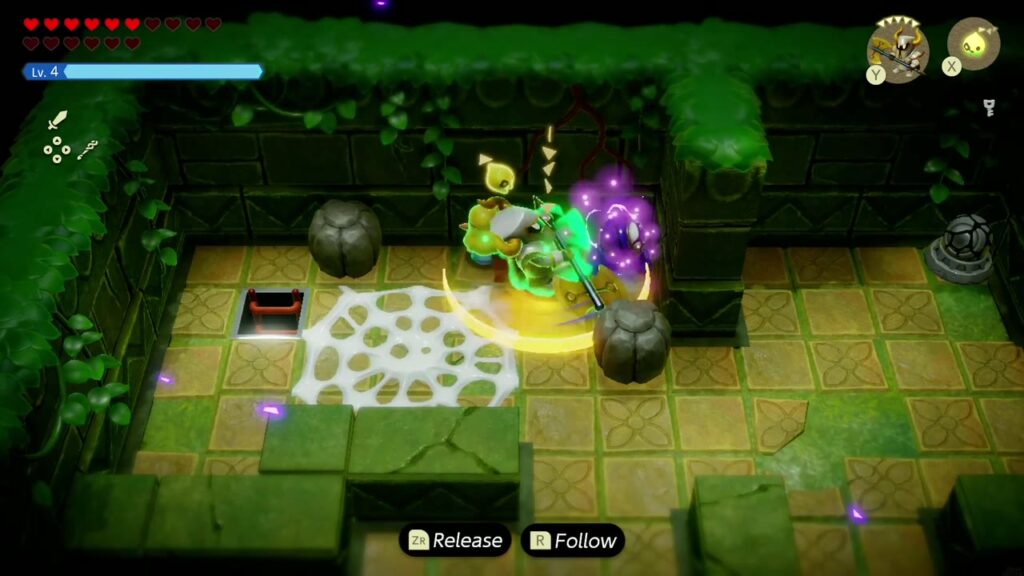 Faron Temple Dungeon - The Legend of Zelda: Echoes of Wisdom Walkthrough 15 Zelda's Darknut echo attacks a blue one-eyed enemy among the boulders and webs on 3F.