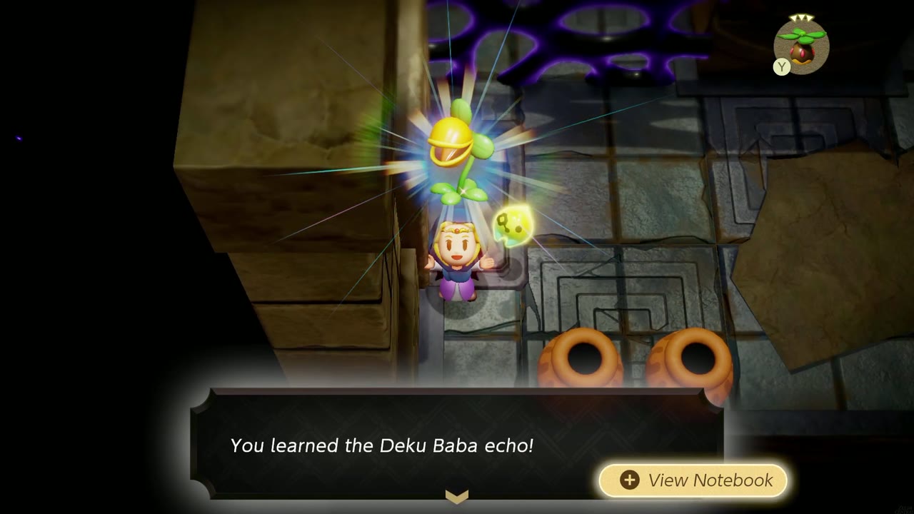 Zelda aprende o Deku O eco de Baba ecoa em uma sala com paredes de gosma na masmorra das Ruínas de Suthorn. Zelda aprende o Deku O eco de Baba ecoa em uma sala com paredes de gosma na masmorra das Ruínas de Suthorn.