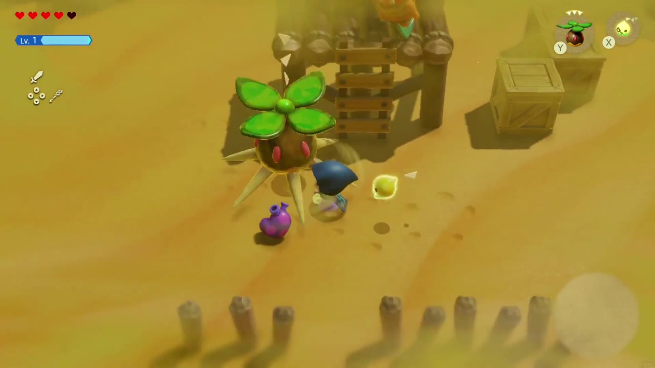 Zelda fights a spiky plant monster in the hazy Gerudo Desert near a wooden platform Zelda fights a spiky plant monster in the hazy Gerudo Desert near a wooden platform