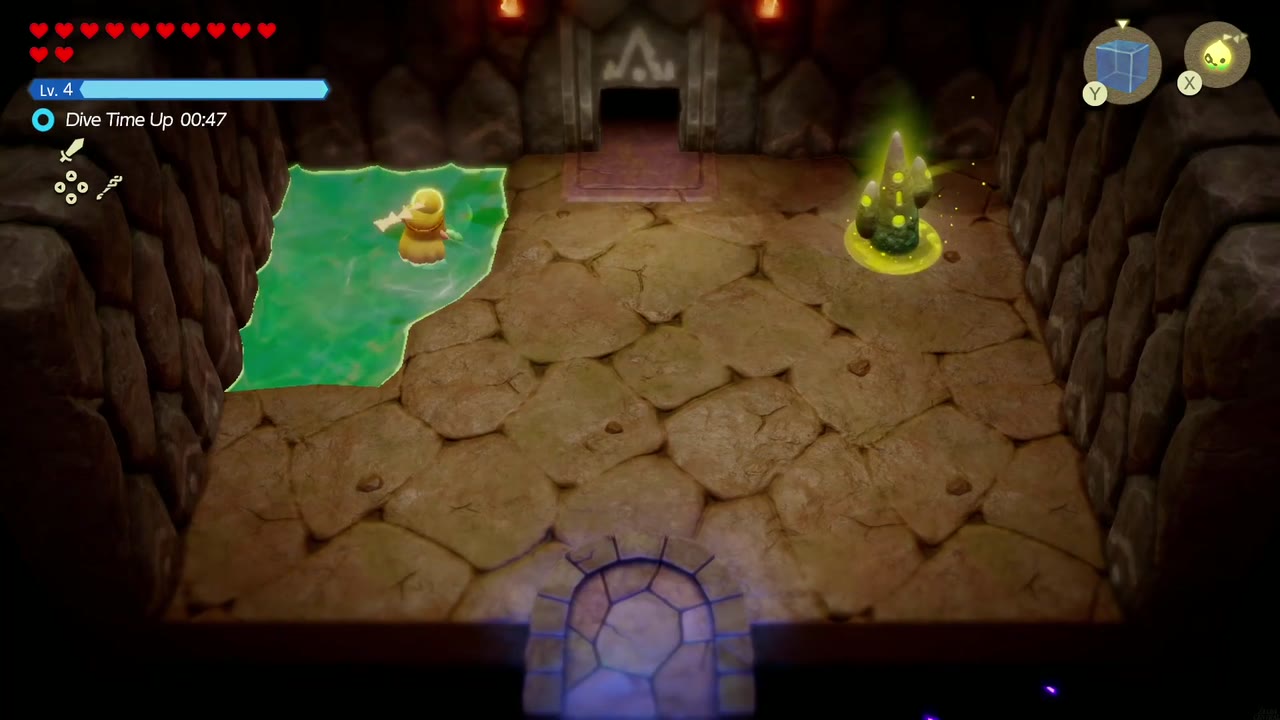 Eldin Temple Dungeon - The Legend of Zelda: Echoes of Wisdom Walkthrough 5 Eldin Temple entrance room with the green Waypoint statue and Zelda wading in the green pool on the left.