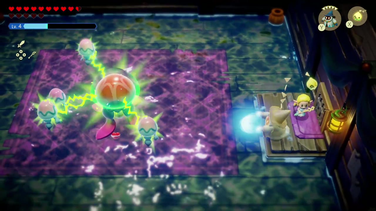 Zelda fights the giant electric jellyfish in the shipwreck's purple-floored room. Zelda fights the giant electric jellyfish in the shipwreck's purple-floored room.