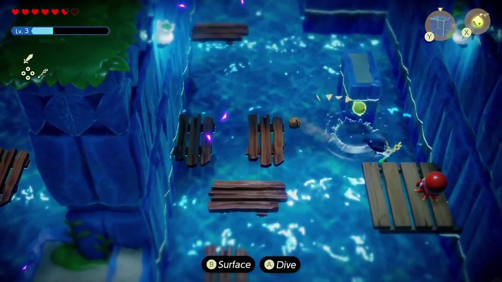 A red enemy waits on a wooden platform on the right side as Zelda swims down the current.