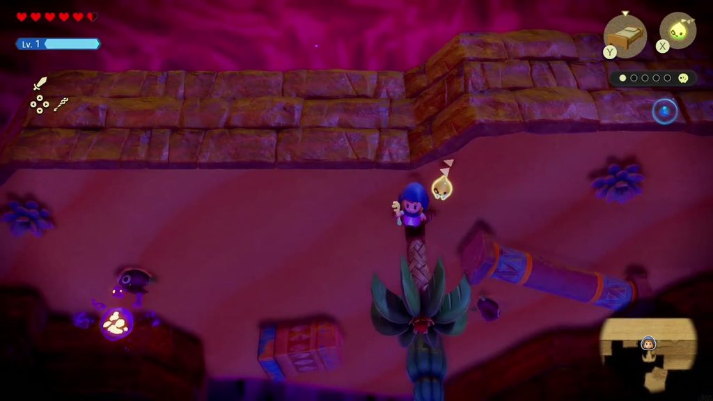 A Rift in the Gerudo Desert - The Legend of Zelda: Echoes of Wisdom Walkthrough 72 Zelda crosses the fallen pillar past a spiky plant toward the raised ledge in the Still World.