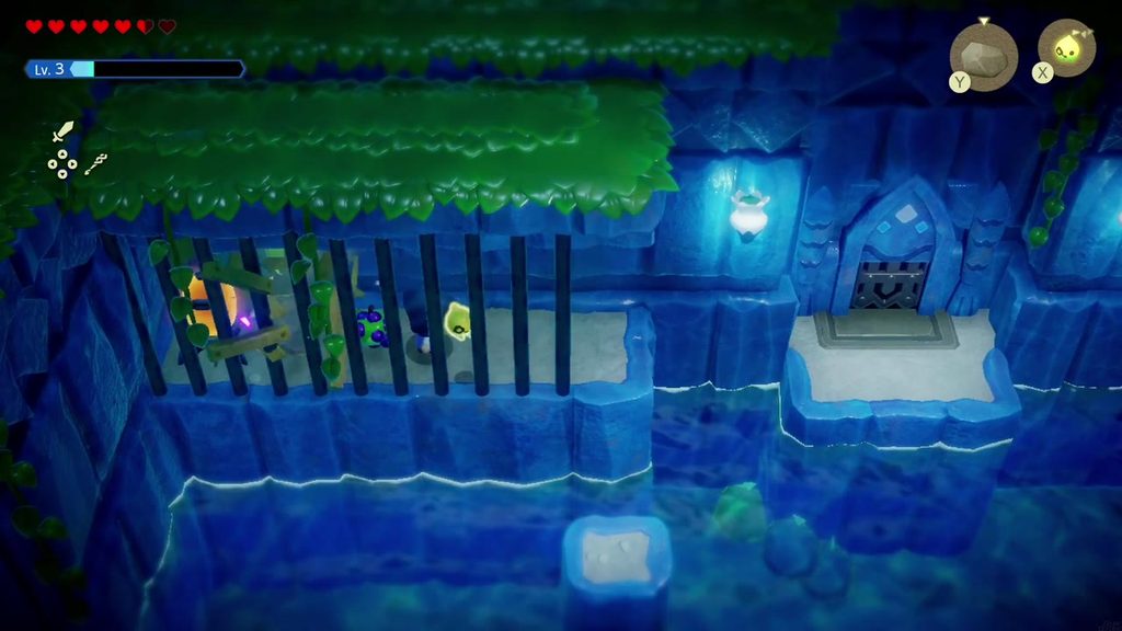 With the Wooden Boxes moved, Zelda flips the fifth device behind the bars to orange.