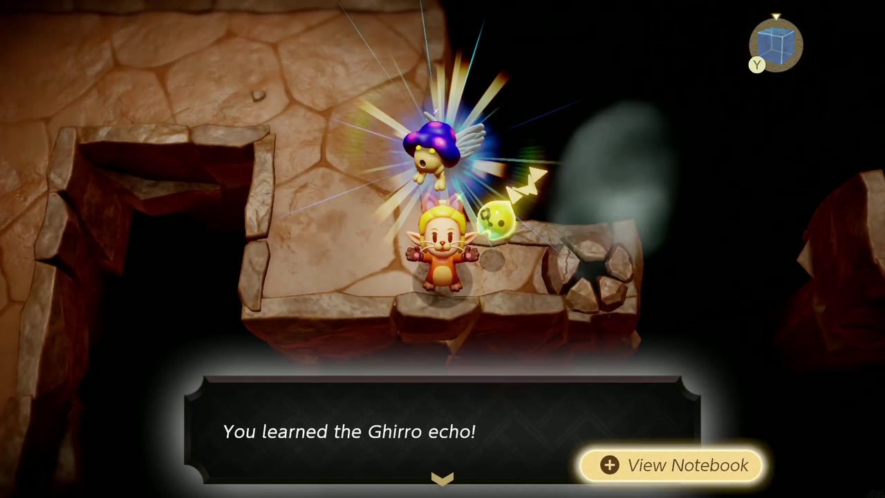Zelda aprende o eco de Ghirro em uma saliência de pedra sobre um poço escuro em uma caverna da Trilha do Vulcão Eldin. Zelda aprende o eco de Ghirro em uma saliência de pedra sobre um poço escuro em uma caverna da Trilha do Vulcão Eldin.