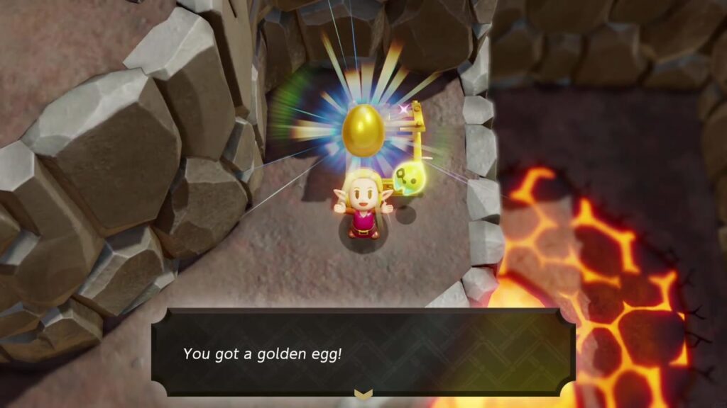 The Rift on Eldin Volcano - The Legend of Zelda: Echoes of Wisdom Walkthrough 44 Zelda holds up a golden egg from the chest on a walled ledge in the grey rock maze on the way to the burrow.