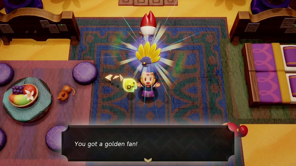 A Rift in the Gerudo Desert - The Legend of Zelda: Echoes of Wisdom Walkthrough 12 Zelda holds up the golden fan won in the second, vibrant-seed round of Mango Rush.
