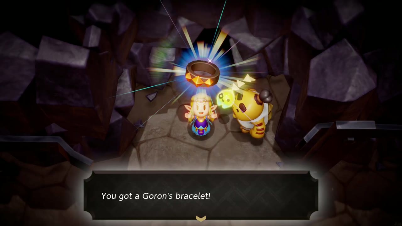 Zelda holds up the Goron's Bracelet beside Darston in an Eldin Volcano cave Zelda holds up the Goron's Bracelet beside Darston in an Eldin Volcano cave