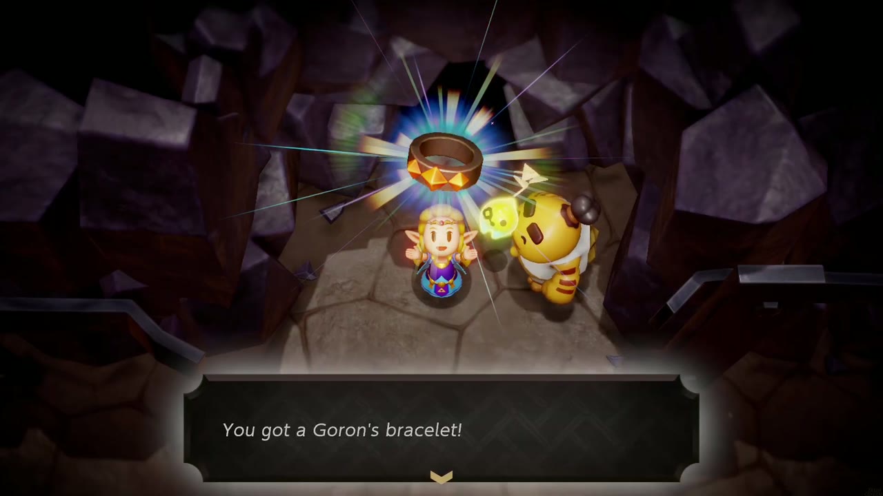 Zelda holds up the Goron's Bracelet that Darston gives for A Mountainous Mystery Zelda holds up the Goron's Bracelet that Darston gives for A Mountainous Mystery