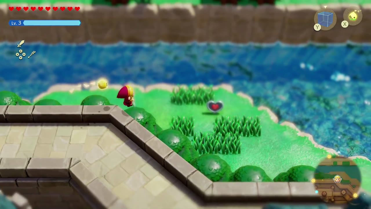 Hyrule Castle: Still Missing - The Legend of Zelda: Echoes of Wisdom Walkthrough 130 A Piece of Heart sits on the grassy ledge between Castle Town's outer wall and the moat, seen from the wall top.