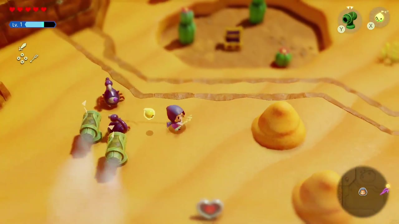 A Rift in the Gerudo Desert - The Legend of Zelda: Echoes of Wisdom Walkthrough 124 With the mound blown away, a Piece of Heart lies exposed on the sand while Wind Cannons fend off Aruroda.