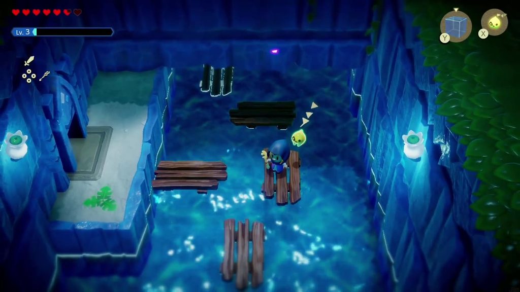 Zelda hops across drifting platforms toward the doorway on the room's top-left ledge.