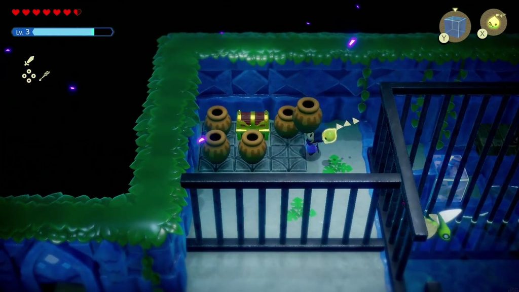 Zelda reaches the jar-ringed ledge and its chest in the corner of the flooded cage room.