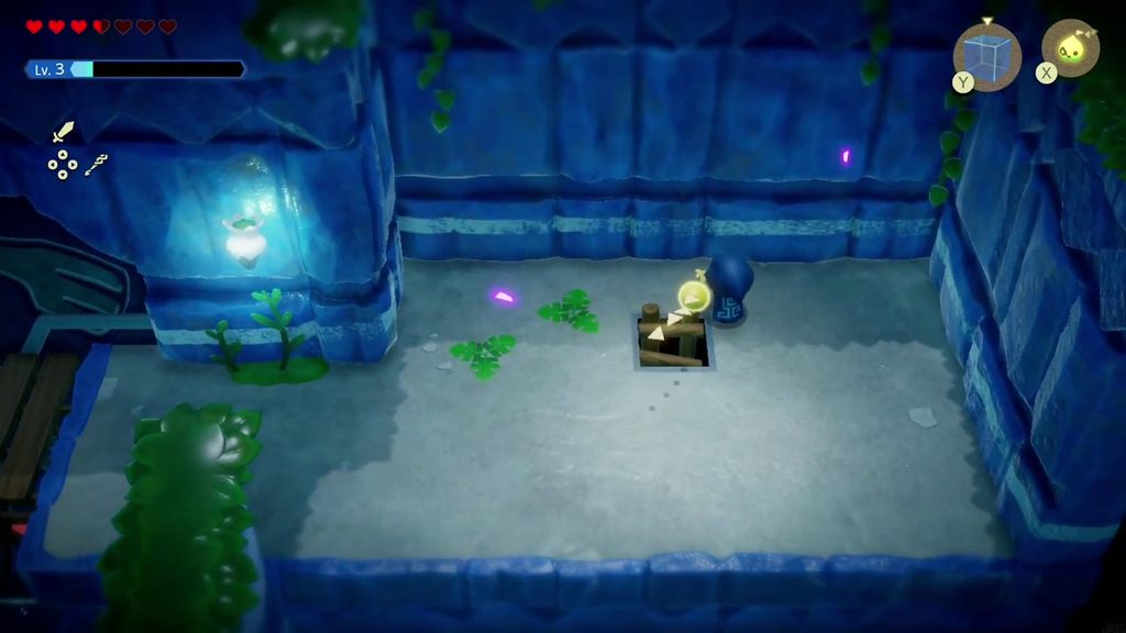 Zelda reaches the ladder hatch in the floor of the room right of the switch-color wall in Jabul Ruins.