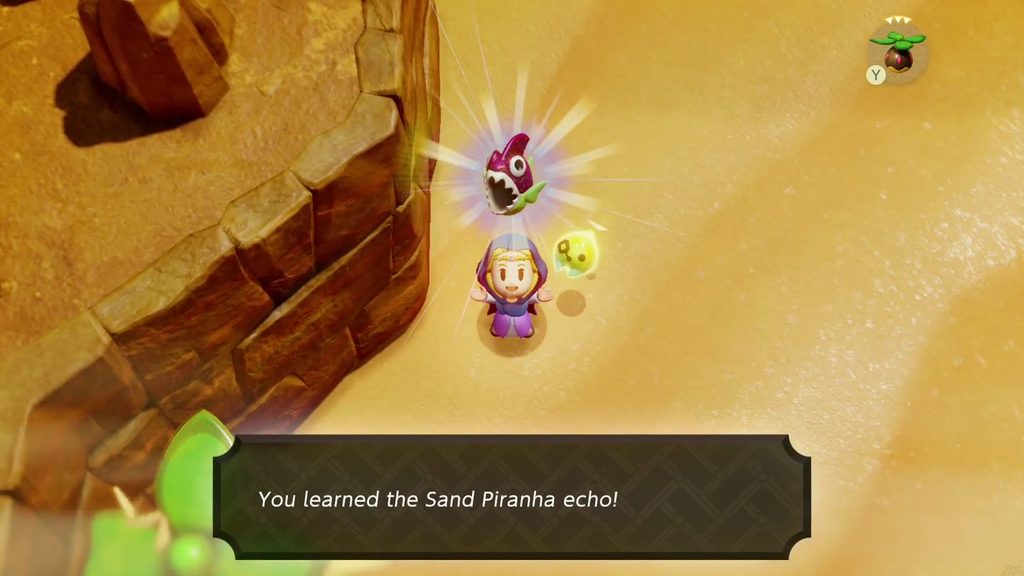 A Rift in the Gerudo Desert - The Legend of Zelda: Echoes of Wisdom Walkthrough 5 Zelda learns the Sand Piranha echo at the foot of a sandstone cliff on the way to the Oasis.