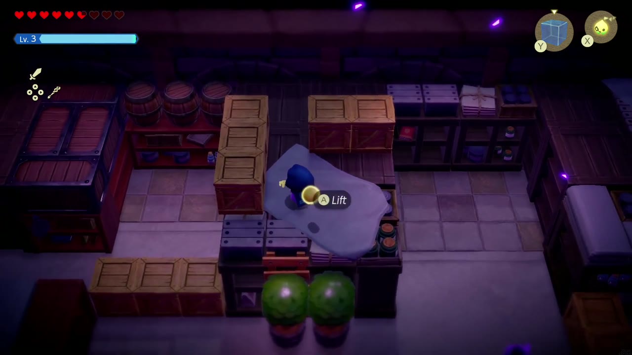 Hyrule Castle: Still Missing - The Legend of Zelda: Echoes of Wisdom Walkthrough 50 Zelda stands on a sheet-covered table and lifts a crate blocking her path in the storeroom.