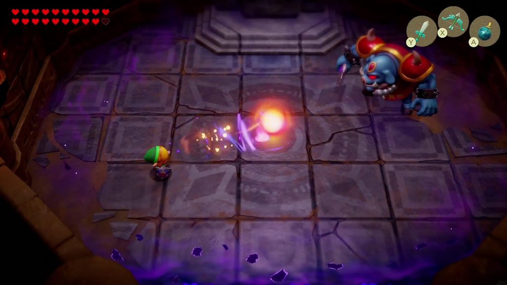 Link swings his sword to send Ganon's fireball flying back at him in the prologue boss fight