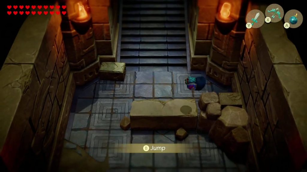 Link reaches a stairway in Suthorn Ruins while the prologue tutorial teaches the Jump button