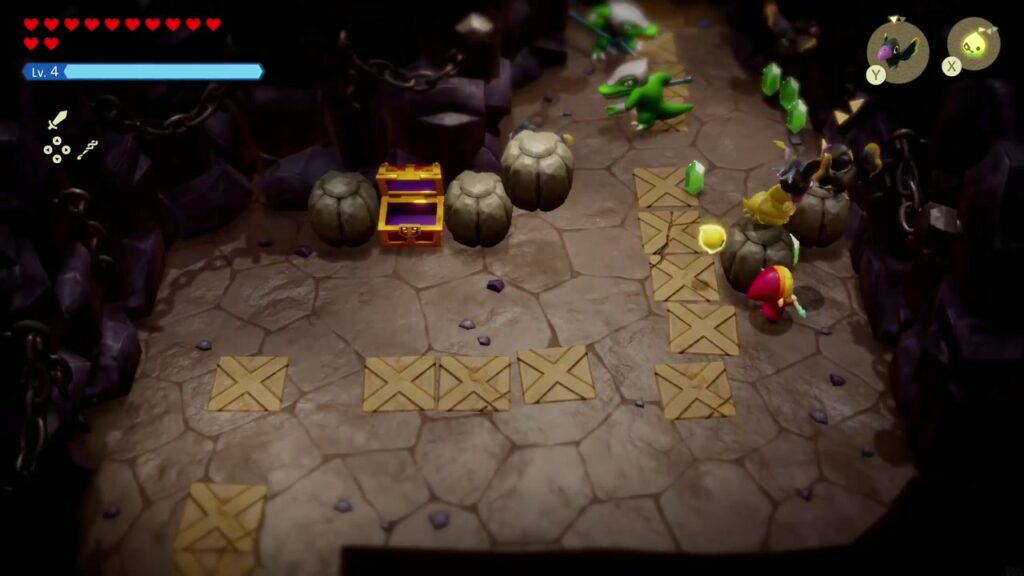 The Rift on Eldin Volcano - The Legend of Zelda: Echoes of Wisdom Walkthrough 47 Zelda and her echoes fight Lizalfos in the crate-tiled first room of Lizalfos Burrow.