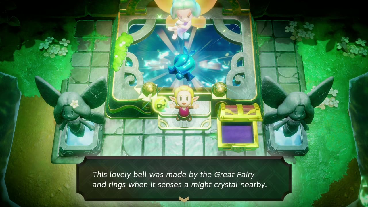 Zelda holds up the might bell, which rings when a might crystal is nearby. Zelda holds up the might bell, which rings when a might crystal is nearby.