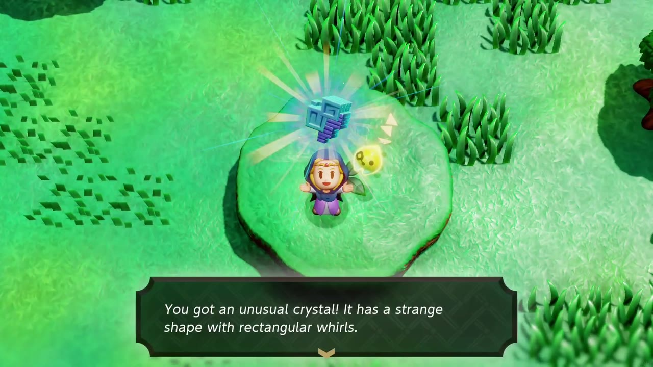 Zelda holds up an unusual crystal on top of a low round grassy mound in Hyrule Field