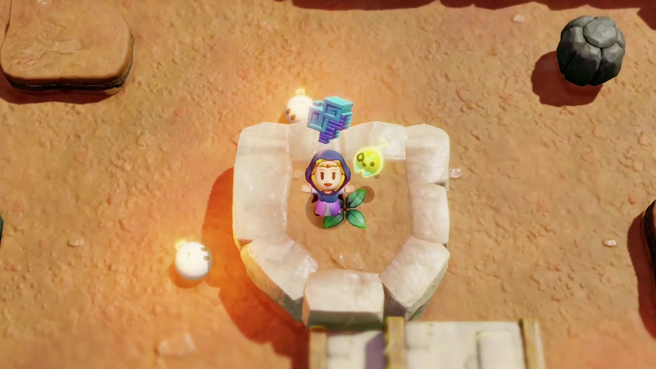 Zelda holds up an unusual crystal inside a low stone ring in a rocky clearing in Hyrule Field, an Old Bed propped against it