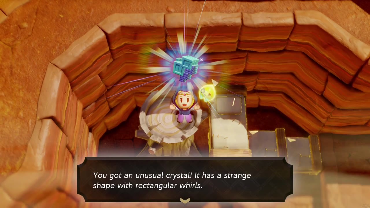 Zelda stands on a tree stump in a red-rock canyon pit, holding up an unusual crystal next to an Old Bed