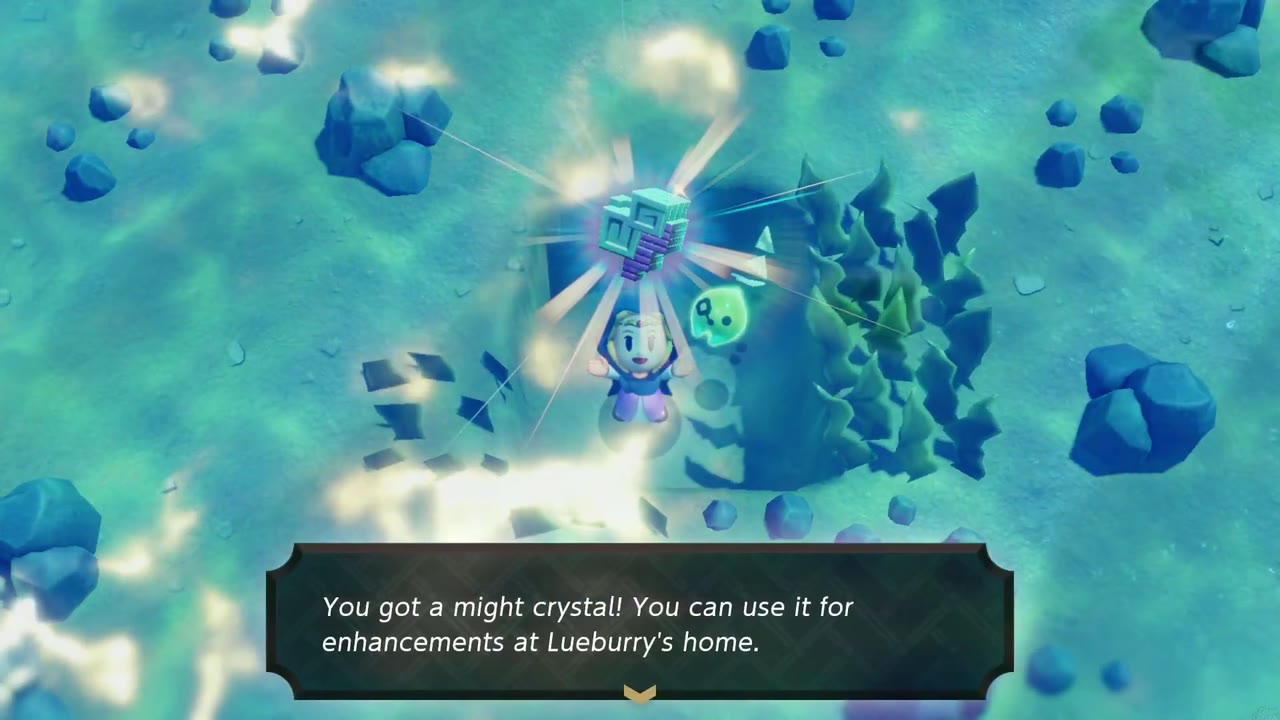 Underwater beside a seaweed-ringed rock, Zelda holds up a might crystal with the 'You got a might crystal!' box shown