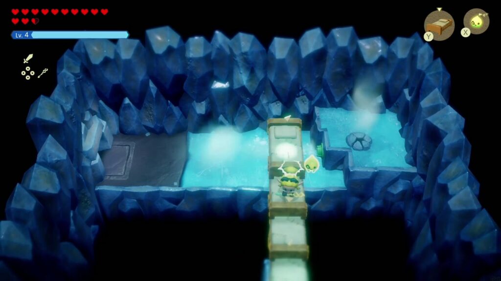 Hebra Mountain: A Rift on Holy Mount Lanayru - The Legend of Zelda: Echoes of Wisdom Walkthrough 62 Zelda crosses a pit on a line of Old Bed echoes in the slippery ice cave room.
