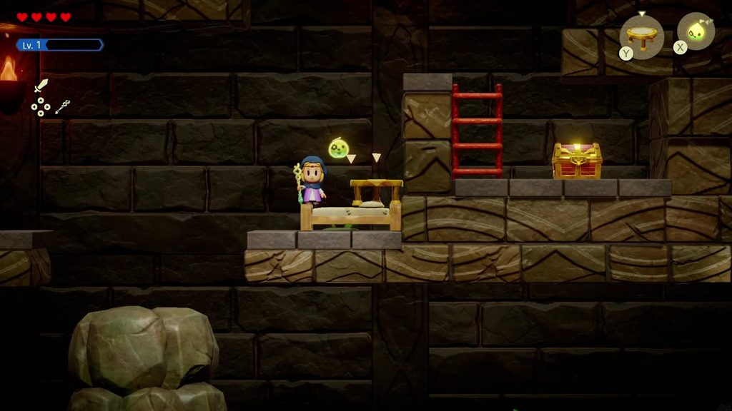 Zelda places an Old Bed echo to climb toward the high chest ledge in the side-view Suthorn Ruins room